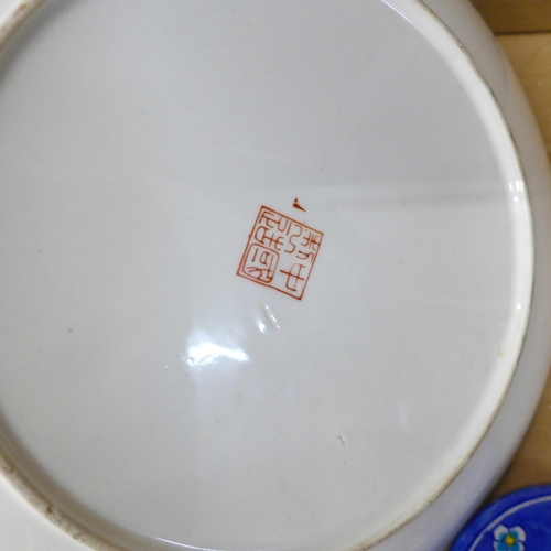 709 - A collection of Chinese and Japanese porcelain, rice bowls, tea cannister, plates, etc.