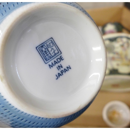 709 - A collection of Chinese and Japanese porcelain, rice bowls, tea cannister, plates, etc.