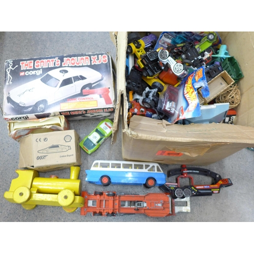 713 - A box of die-cast model vehicles, Corgi The Saint's Jaguar XJS, 007 Lotus Esprit, etc.