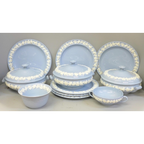 718 - A collection of Wedgwood of Etruria embossed Queen's Ware blue and white vine dinner and tea ware, t... 