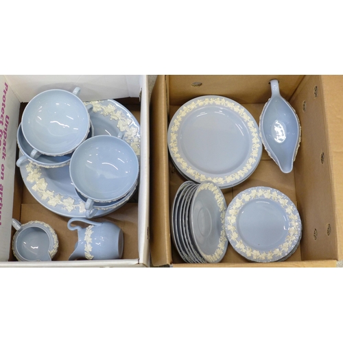 718 - A collection of Wedgwood of Etruria embossed Queen's Ware blue and white vine dinner and tea ware, t... 