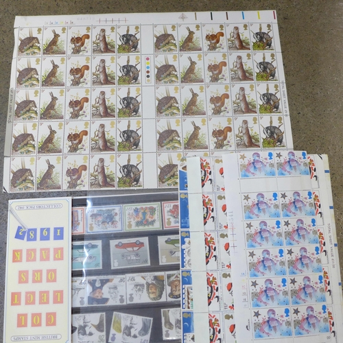 724 - Two albums of Royal Mail millennium and Royal Family stamps, (40+ packs) two albums of European and ... 