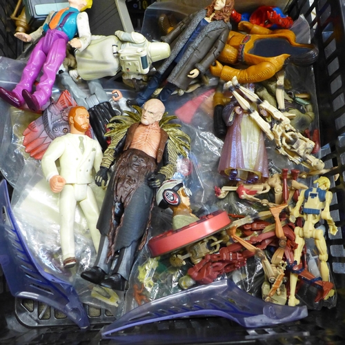 737 - A box of mixed action figures, He-Man, Michael Jackson, Star Wars, etc.