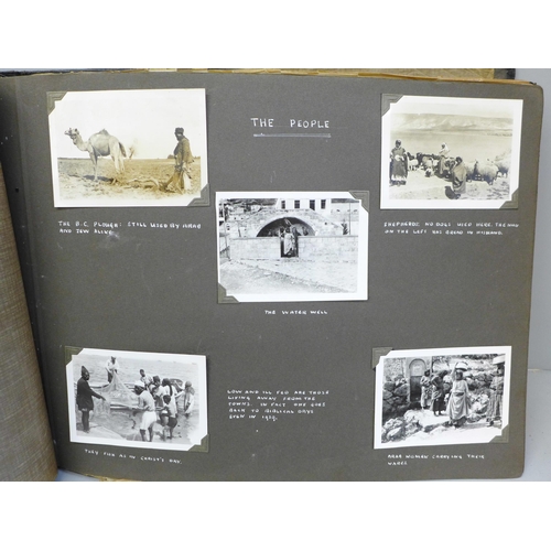 740 - A photograph album containing photographs of warships and Royalty, Suez Canal images, etc.