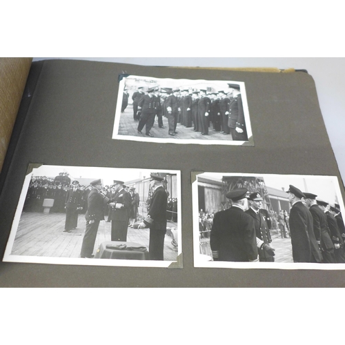 740 - A photograph album containing photographs of warships and Royalty, Suez Canal images, etc.