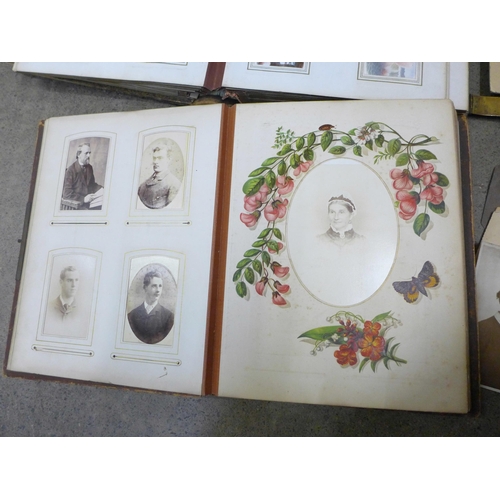 749 - Two Victorian photograph albums containing carte de visites and cabinet cards, both incomplete and o... 