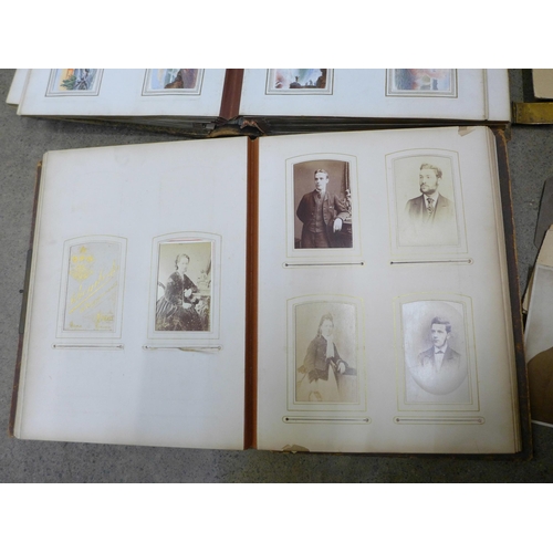 749 - Two Victorian photograph albums containing carte de visites and cabinet cards, both incomplete and o... 