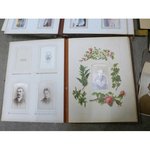 749 - Two Victorian photograph albums containing carte de visites and cabinet cards, both incomplete and o... 