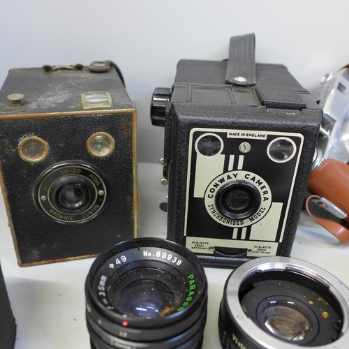 755 - A collection of vintage cameras and lenses including Comet II and Chinon