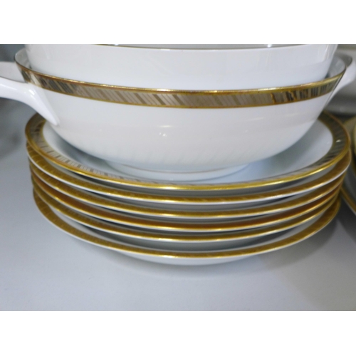 771 - A Rosenthal gold rimmed dinner service **PLEASE NOTE THIS LOT IS NOT ELIGIBLE FOR POSTING AND PACKIN... 