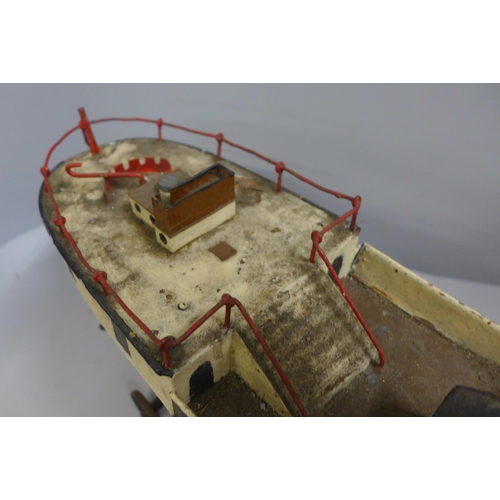 787 - A Victorian pressed steel clockwork paddle steamer pond yacht, incomplete, 50cm