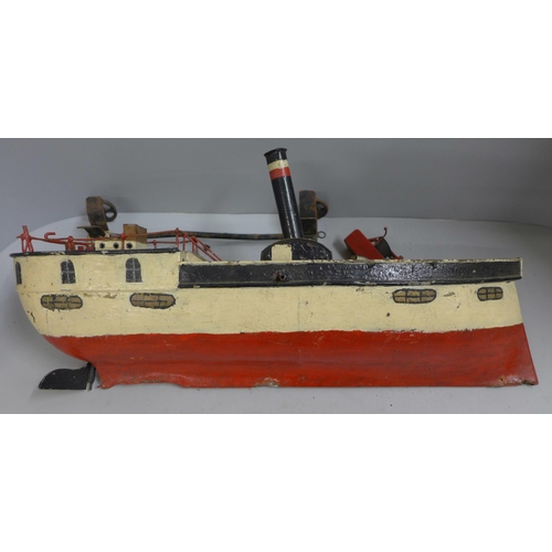 787 - A Victorian pressed steel clockwork paddle steamer pond yacht, incomplete, 50cm