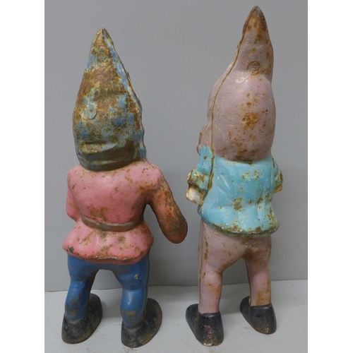 793 - Two cast metal garden gnomes, possibly Victorian, tallest 29cm