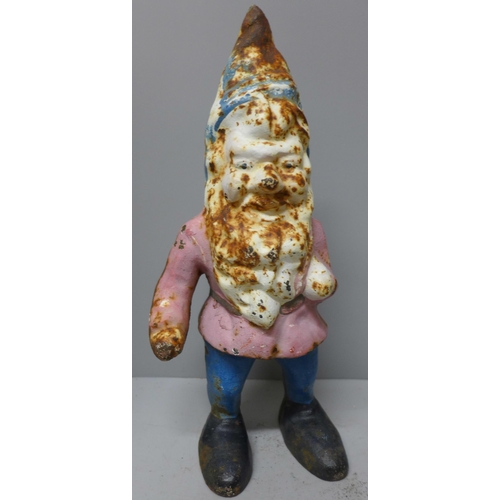 793 - Two cast metal garden gnomes, possibly Victorian, tallest 29cm