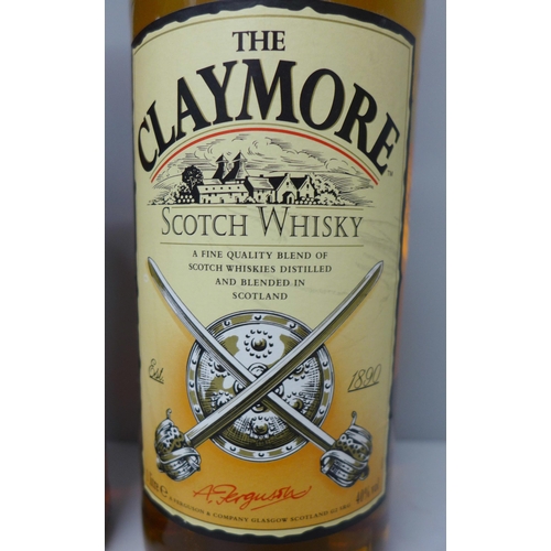 804 - A bottle of The Claymore Scotch Whisky and a bottle of Admiral Benbow Old Navy Rum **PLEASE NOTE THI... 