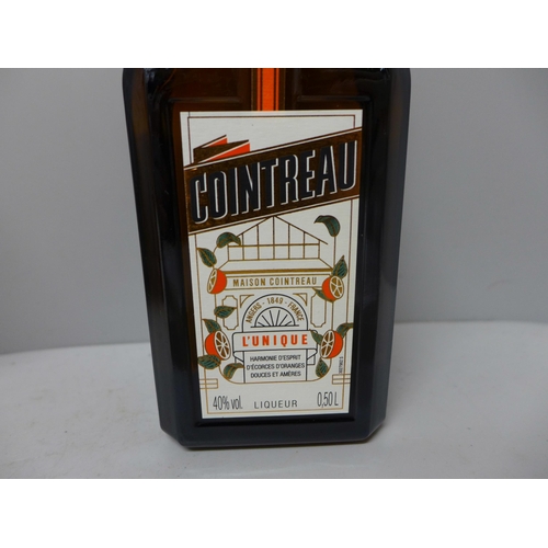 813 - A bottle of Cointreau, a bottle of Duke of Clarence Madeira and a bottle of Soberano 5yrs Reserve Br... 