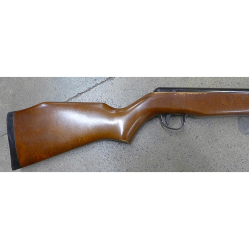 817 - A Webley Vulcan .22 calibre air rifle with purchase guarantee for 1980 and leather case