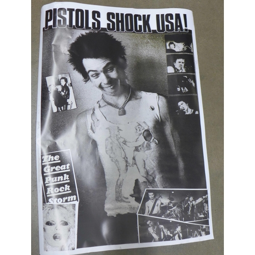 818 - A collection of approximately 50 film and music reproduction posters, many Sex Pistols