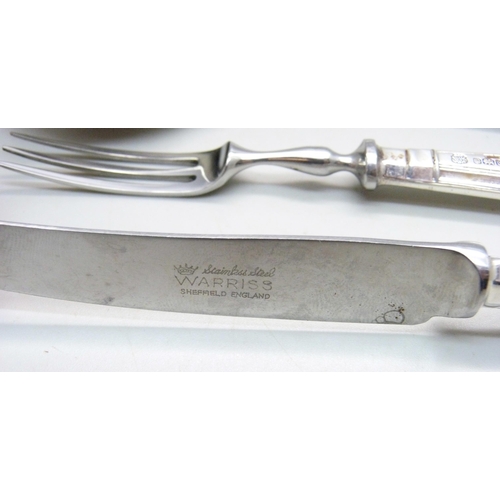 845 - A silver spoon, 63g and a silver handled pastry knife and fork