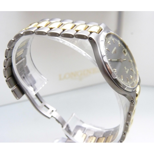 848 - A pair of lady's and gentleman's Longines Conquest Titanium wristwatches, cased, (gentleman's with s... 