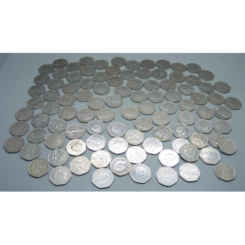 864 - One hundred mixed commemorative 50p coins