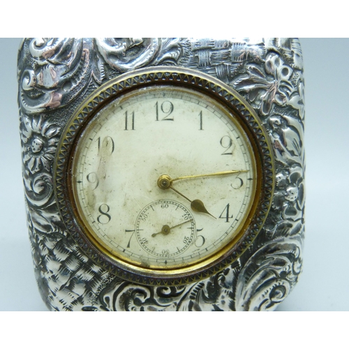 881 - A silver fronted travel clock, Birmingham 1900, 77mm x 65mm