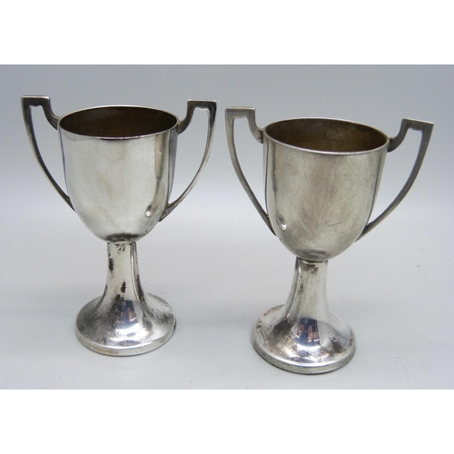 882 - A pair of silver two handled trophies, London marks, 73g