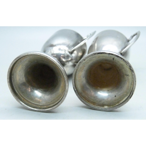 882 - A pair of silver two handled trophies, London marks, 73g