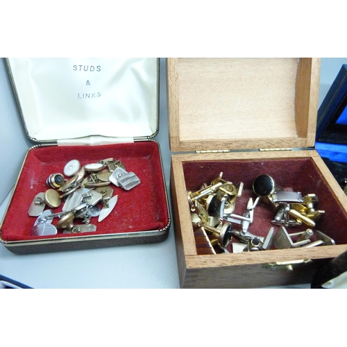 887 - A large bag of cufflinks and tie pins