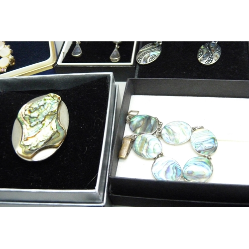 889 - A collection of mother of pearl and abalone jewellery including some silver