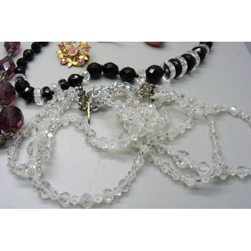 903 - Costume jewellery including faceted bead necklaces, brooches, etc.