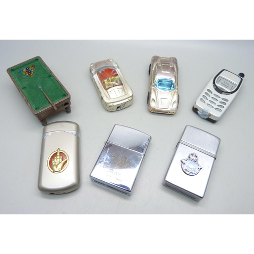 923 - A collection of novelty lighters