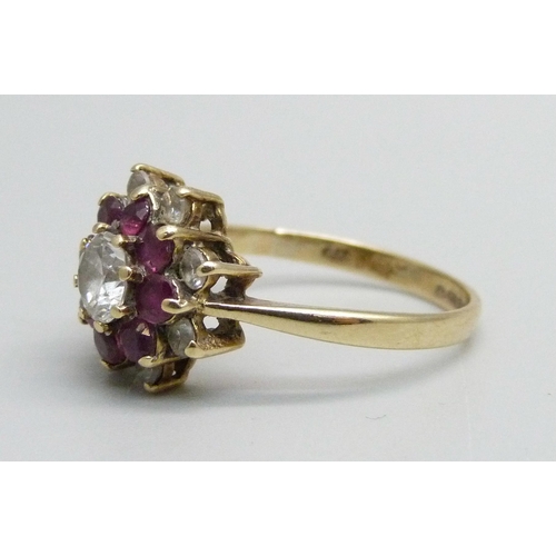 929 - A 9ct gold, red and white stone cluster ring, 2.6g, O