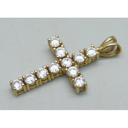 933 - A 9ct gold cross pendant set with white stones, 2.2g, 3cm