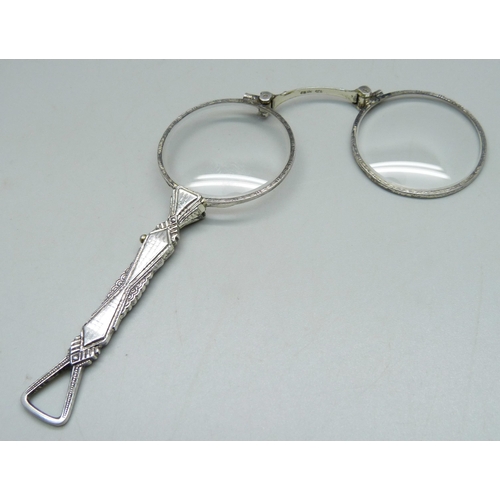 948 - A pair of .935 silver lorgnettes