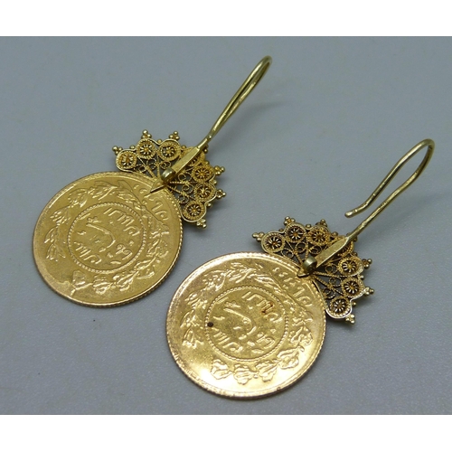 981 - A pair of yellow metal mounted earrings, Persian 1914 1 Toman coins, 0.900, 7.5g, 4.2cm drop