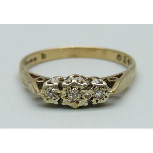 984 - A 9ct gold ring set with three small diamonds, 2g, O