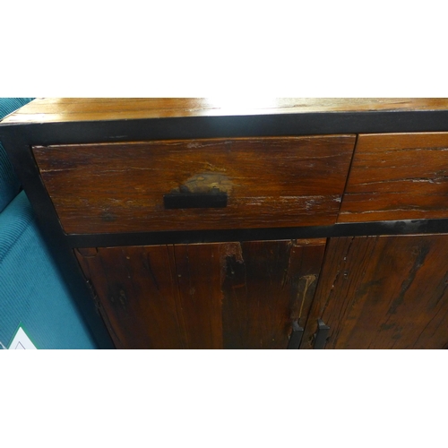 1408 - An industrial style hardwood and metal three door, three drawer cabinet on wheels * this lot is subj... 