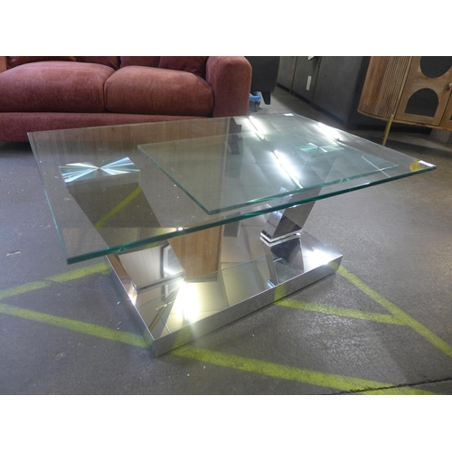 1461 - A chrome and glass swivel coffee table