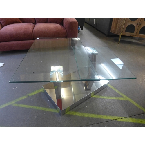 1461 - A chrome and glass swivel coffee table