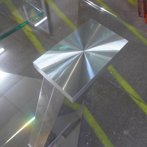 1461 - A chrome and glass swivel coffee table