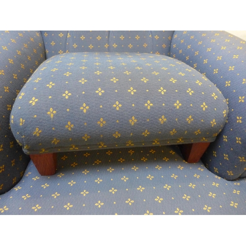 1527 - A blue upholstered armchair and stool