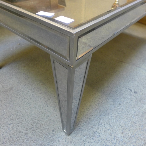 1550 - A silver painted and mirrored coffee table