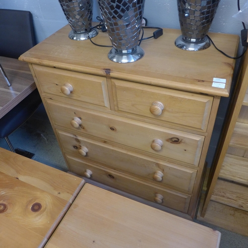 1565 - A pine two over three chest of drawers