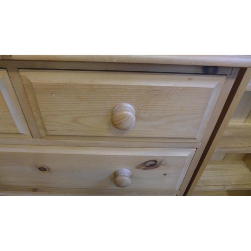 1565 - A pine two over three chest of drawers