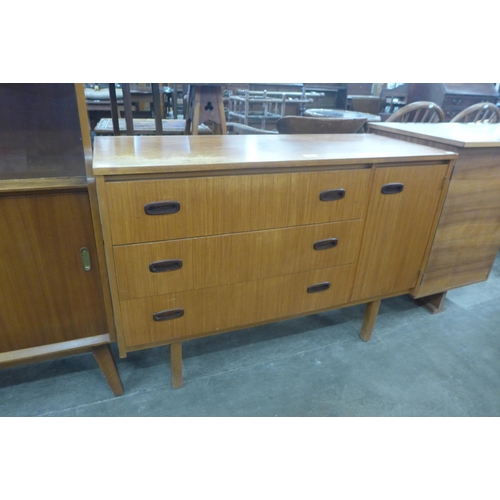 106 - A small teak sideboard