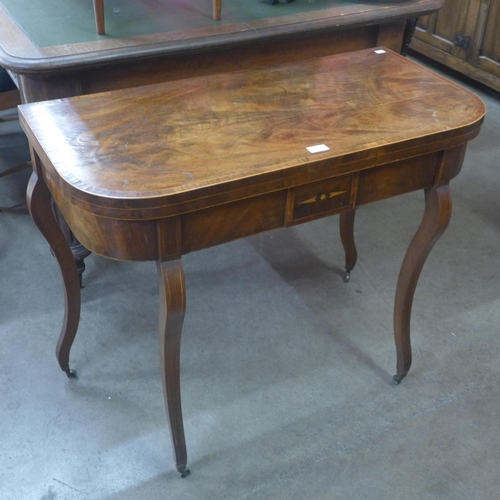 113 - A 19th Century Biedermeier inlaid mahogany fold over card table