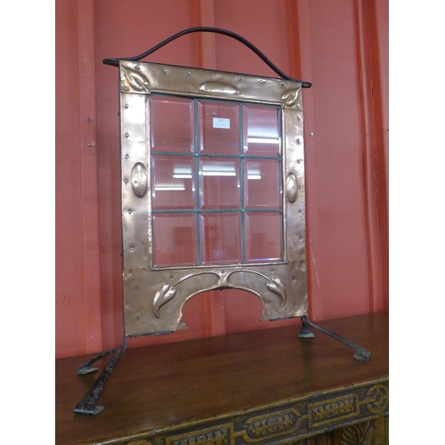 118 - An Arts and Crafts copper and wrought iron fire screen