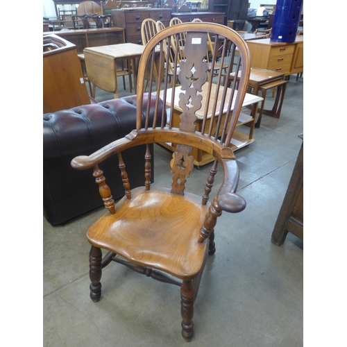 119 - A 19th Century elm and yew wood highback Windsor chair