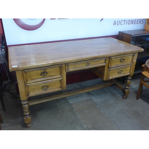 120 - A 19th Century French style elm desk